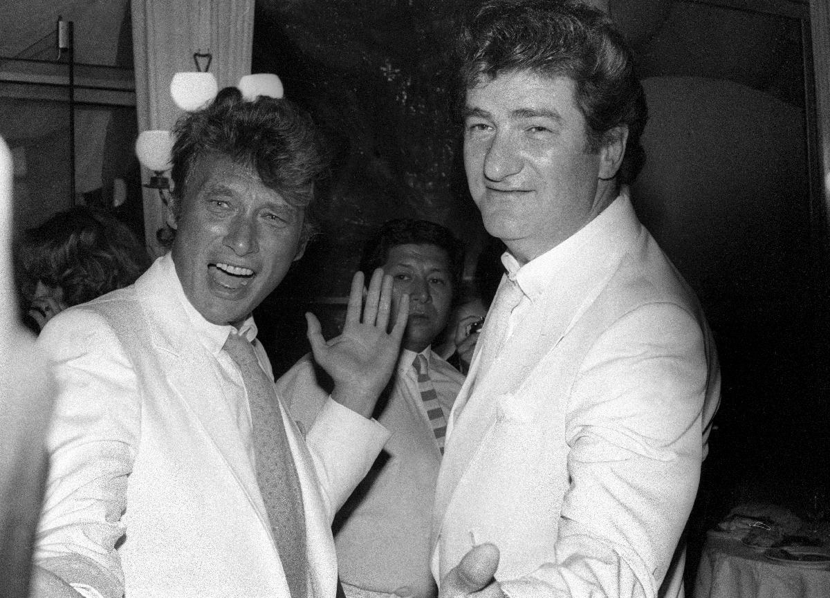 Johnny Hallyday et Eddy Mitchell lors de la soirée de mariage de Eddie Barclay - 22 06 84